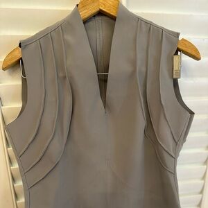 Beautiful Maria Pinto sleeveless gray v - neck shirt.